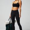 Define PowerHold® Split Hem Flare Pant, Moisture-Wicking, 4-Way Stretch